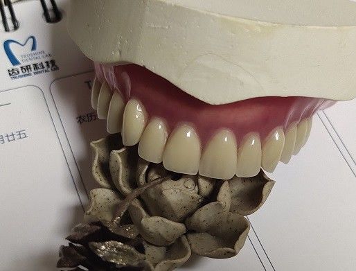 طقم أسنان أكريليكي دائم لتجميل الأسنان